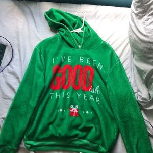 I’m selling a green Christmas sweater